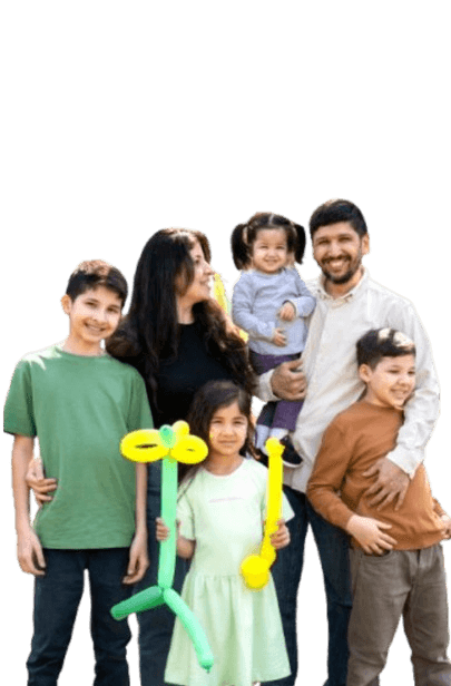 Happy multi-generational Indian family planning their finances